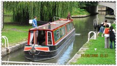 James is helping someone to open the gate of canal