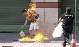 Greek_man_burning