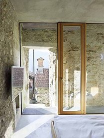 543dd5f0c07a802a69000258_stone-house-transformation-in-scaiano-wespi-de-meuron-romeo-architects_1430_cf030772-749x1000