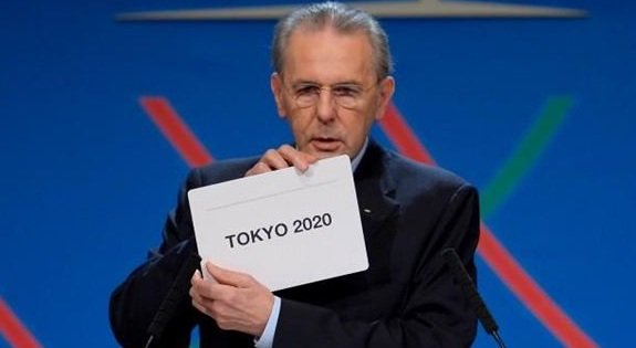 2020日本東京奧運,日本打敗西班牙馬德里市與土耳其伊斯坦堡市,申請奧運主辦權成功,第六次奧運主辦國 (安倍晉三,經濟效益,選手村園區,奧運五色環意義)