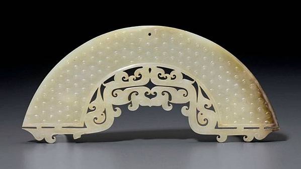 2015_NYR_11418_0004_000(a_very_rare_white_jade_arc-shaped_pendant_huang_china_late_eastern_zho)