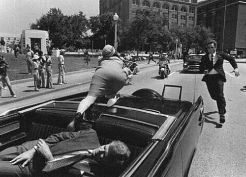 jackie-kennedy-leaping-from-car.jpg