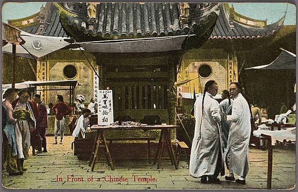 800px-In_front_of_a_Chinese_temple_(NYPL_Hades-2359260-4043616) (1)