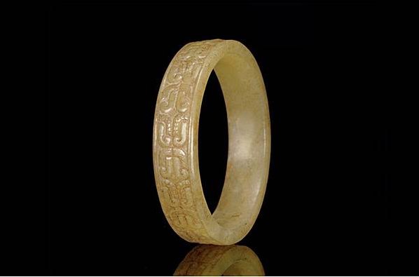 a-rare-small-yellowish-green-jade-bangle