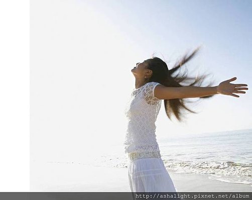 JPEG Woman stretching on beach