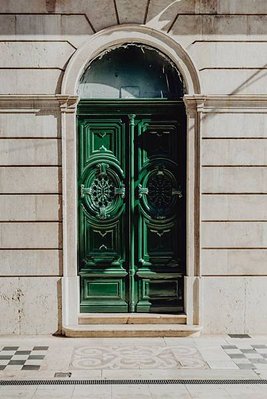 kaboompics_Colorful wooden door in the facade of a typical Portuguese house at Lisbon, Portugal.jpg