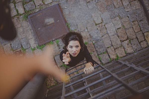 high-angle-photo-of-woman-on-ladder-2467396