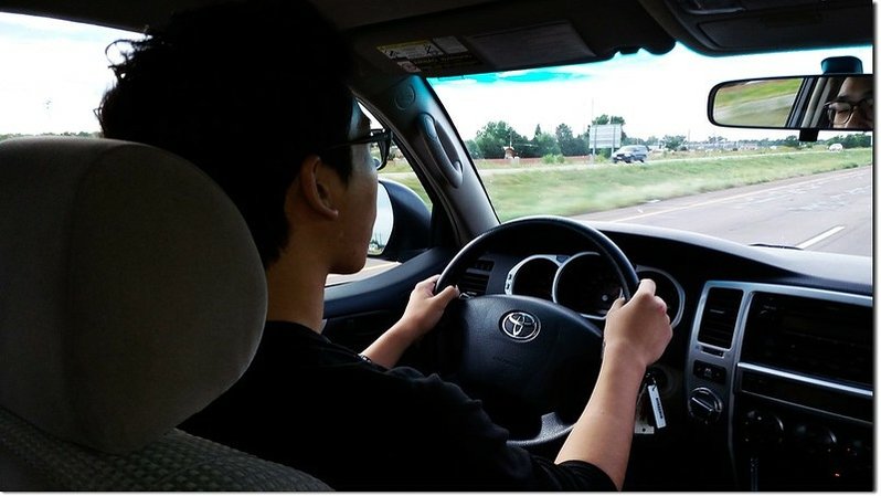 Matthew driving the car