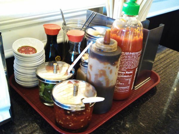 Nice condiments on the table. 