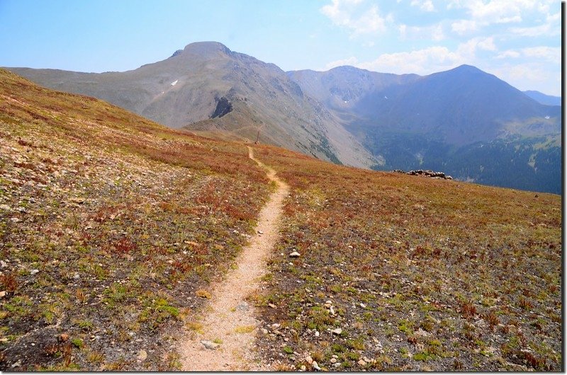 The route turns south on the Continental Divide Trail with great views south of James Peak