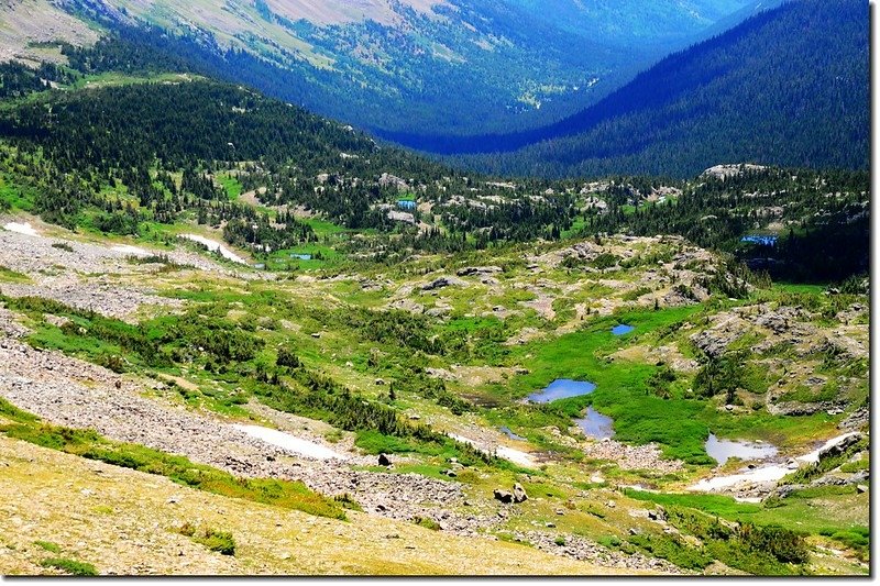 The upper valley is crossed by snow fed streams and tarns 2