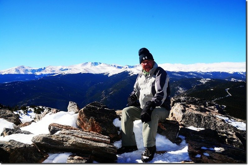 Me on the summit of Chief Mountain, in the background is Mount Evans Massif 1