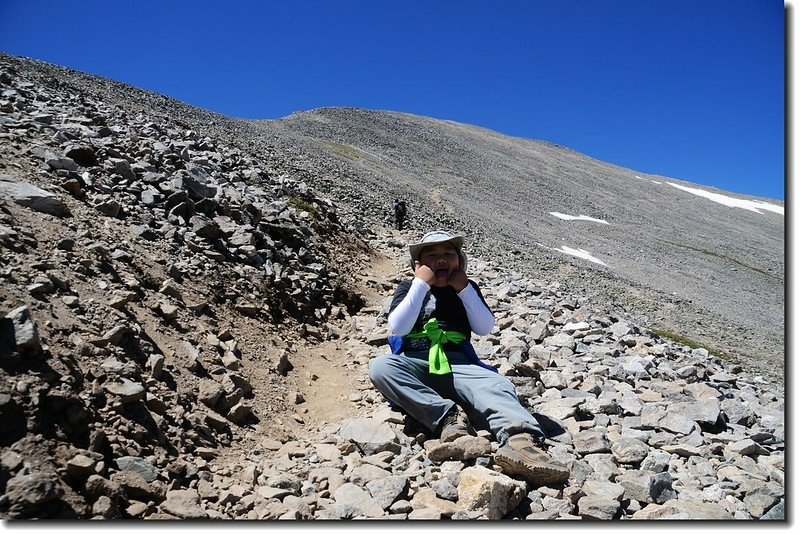 Jacob is taking a break at the Grays Peak trail 4