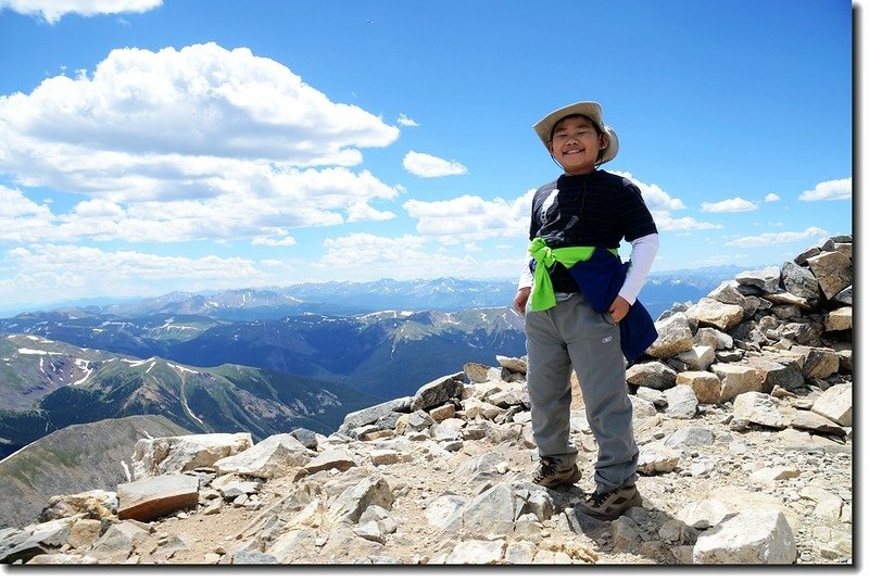 Jacob on the summit of Grays Peak&apos;s summit 3