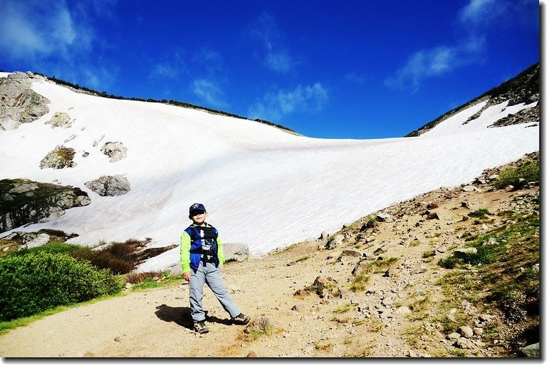 Jacob at the base of St Mary&apos;s Glacier