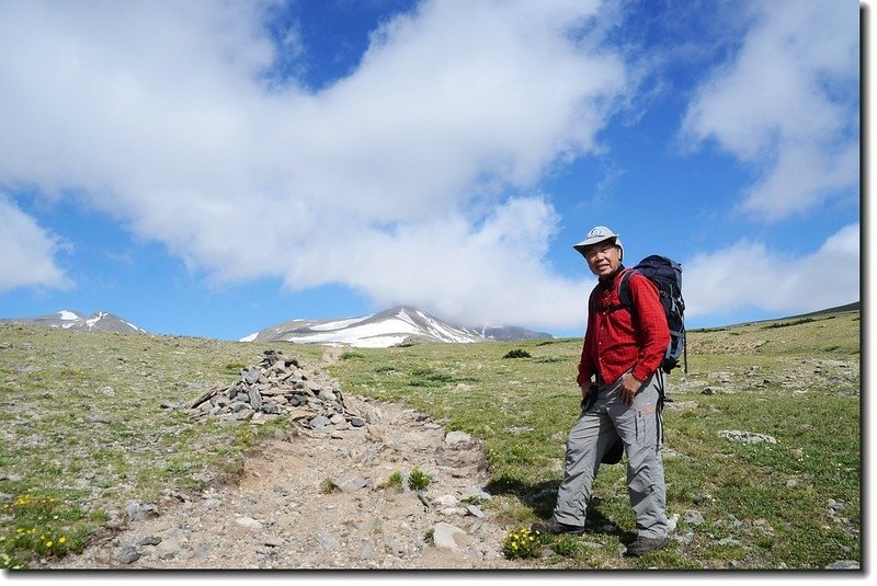 At the top of St. Mary&apos;s Glacier, background is James Peak