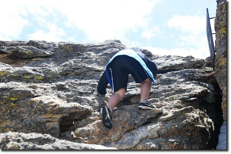 Jacob climbing to the top of Toll Memorial Trail