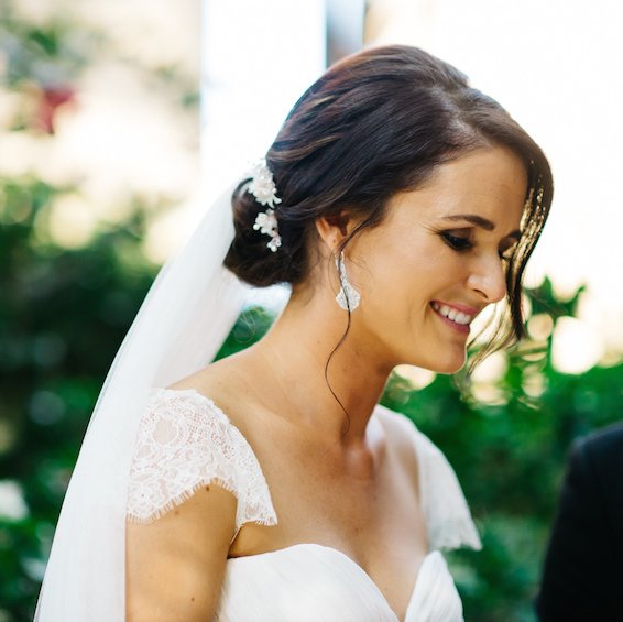 2018-wedding-hair-trends-low-set-updo-with-hair-pins-and-veil.jpg