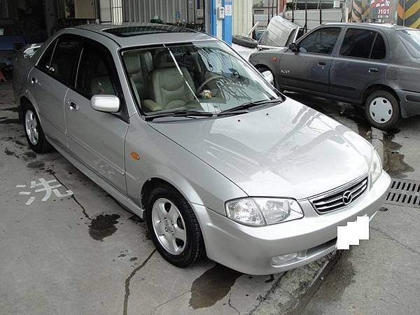 台中市 八益汽車烤漆廠 2001年 馬自達 Mazda Protege 香檳金改琉璃金 完工照1(複製).JPG