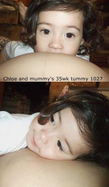 Chloe 1027 with mummy&apos;s 35 wks tummy.jpg