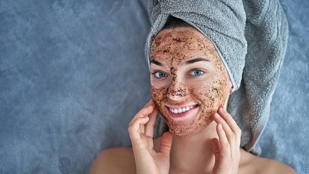 portrait-smiling-healthy-female-bath-towel-with-natural-cleansing-face-coffee-scrub-after-shower_122732-2284.jpg