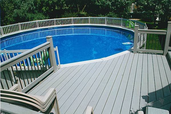 Round-above-ground-composite-pool-with-decks-railing.jpg