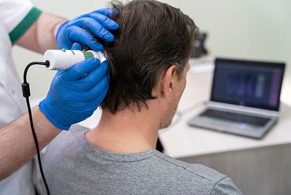 man-getting-hair-loss-treatment.jpg