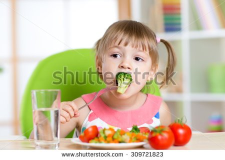 stock-photo-child-little-girl-eats-vegetable-salad-using-fork-309721823