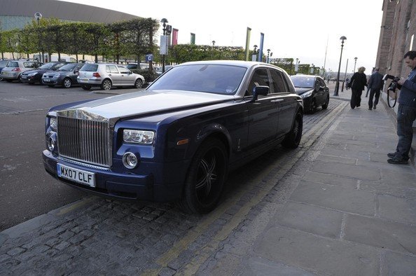 Djibril Cisse and his wife Jude Littler, arrive in their new Rolls Royce at Liverpool&apos;s Albert Dock for a night out..bmp