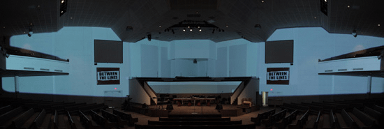 The masked area blocks projector light from screens, choir area, main seating, balconies, and ceiling elements.