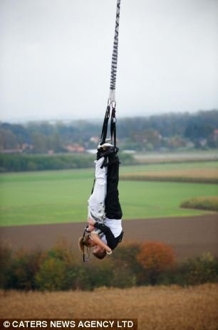 Taking_the_plunge_Thrill_seeking_couple_get_married_160ft_up_in_the_air_(and_then_bungee_jump_off_platform)_1.jpg
