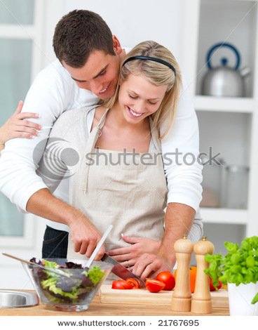 stock-photo-portrait-of-a-modern-romantic-couple-preparing-a-meal-21767695.jpg