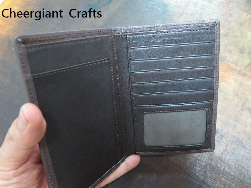 Passport wallet, hand carved jumping fish pattern. genuine calf lining. 護照皮夾真皮內裡 01