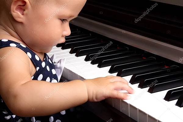 depositphotos_35418127-stock-photo-baby-girl-playing-the-piano.jpg