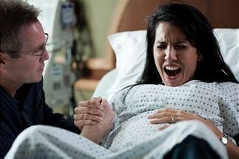 woman-giving-birth-photo-by-rubberball-productions-getty-images