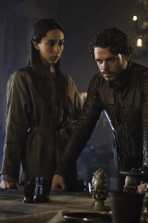 Oona Chaplin as Talisa Westerling and Richard Madden as Robb Stark