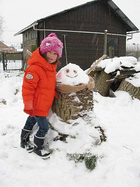 Chloe with snow man