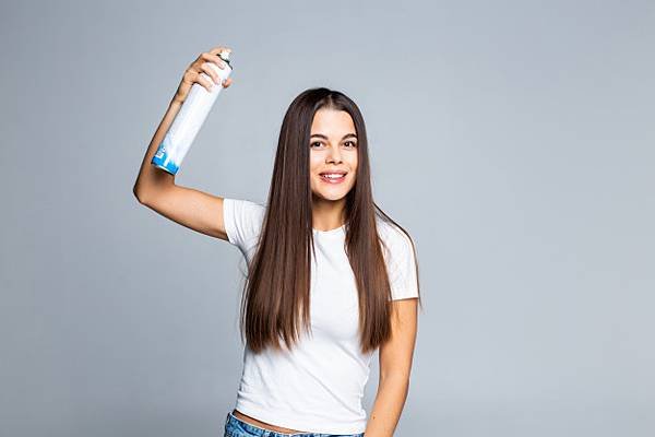 attractive-woman-spraying-hairspray-isolated-white_231208-1647.jpg
