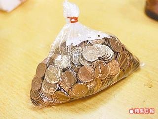 50個1元銅板買水餃 店家拒收.jpg