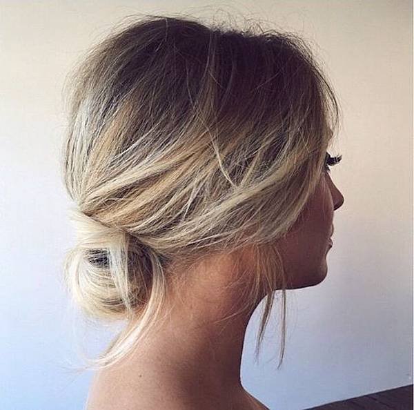 2018-wedding-hair-trends-relaxed-bridal-updo.jpg