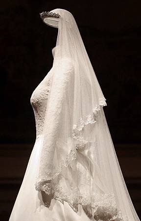 135199-the-wedding-dress-of-britains-catherine-duchess-of-cambridge-is-seen-a.jpg