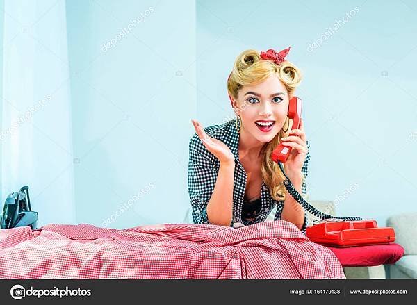 depositphotos_164179138-stock-photo-housewife-ironing-and-talking-on.jpg