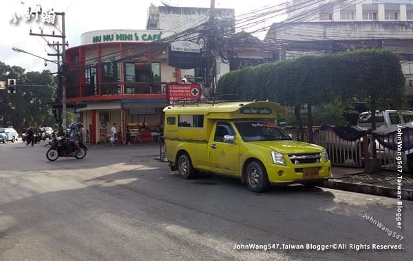 Yellow Songthaew Chiang Mai gate.jpg