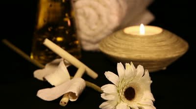 stock-footage-essential-oil-bottles-towels-candle-and-flower-for-healthy-spa-treatment-shoot-canon-d-mark-ii (1)