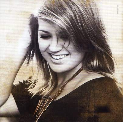 kelly-clarkson-stronger-deluxe-edition-2011-inside-cover-82780.jpg