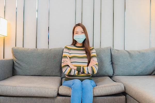 portrait-beautiful-young-asian-woman-wears-mask-sofa-living-room-interior_74190-13120.jpg