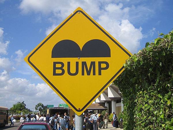 1280px-Belize_Speed_Bump_Sign