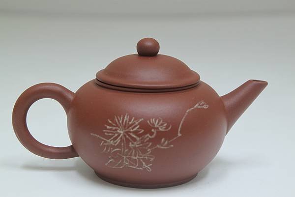 宜興一廠_束旦生(石雪) 製刻四君子紫砂水平壺