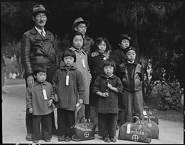 Japanese_American_Internment_-_Members_of_the_Mochida_Family_Awaiting_Evacuation_1942.gif