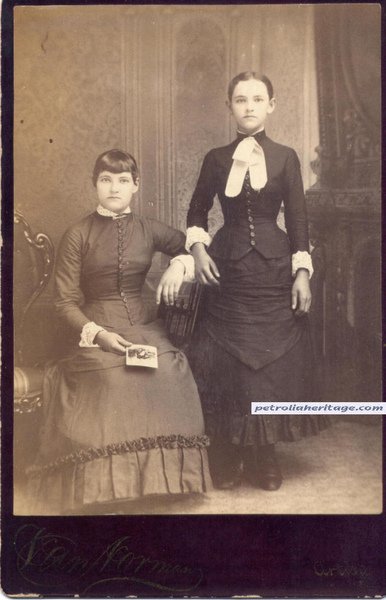 Some have said that the girl on the right is a post mortem or are they both just girls with odd eyes.jpg